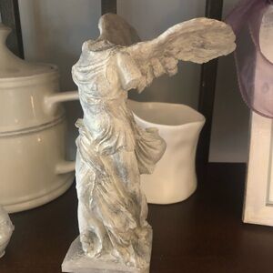 Elegant Gray Winged Victory Sculpture